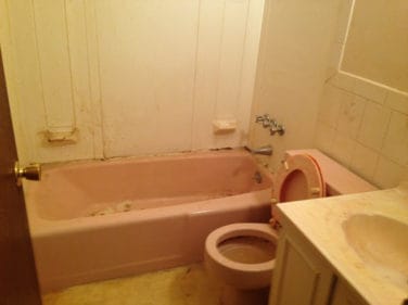 should i sell my st louis house as is - picture of outdated bathroom